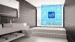 Ein modernes Badezimmer mit einem eleganten Waschbecken, einem großen Spiegel und einer Fensteransicht auf die Landschaft.